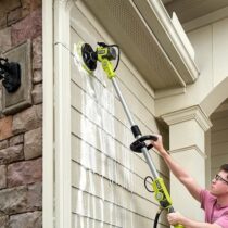 Ryobi soap dispensing telescoping scrubber in use